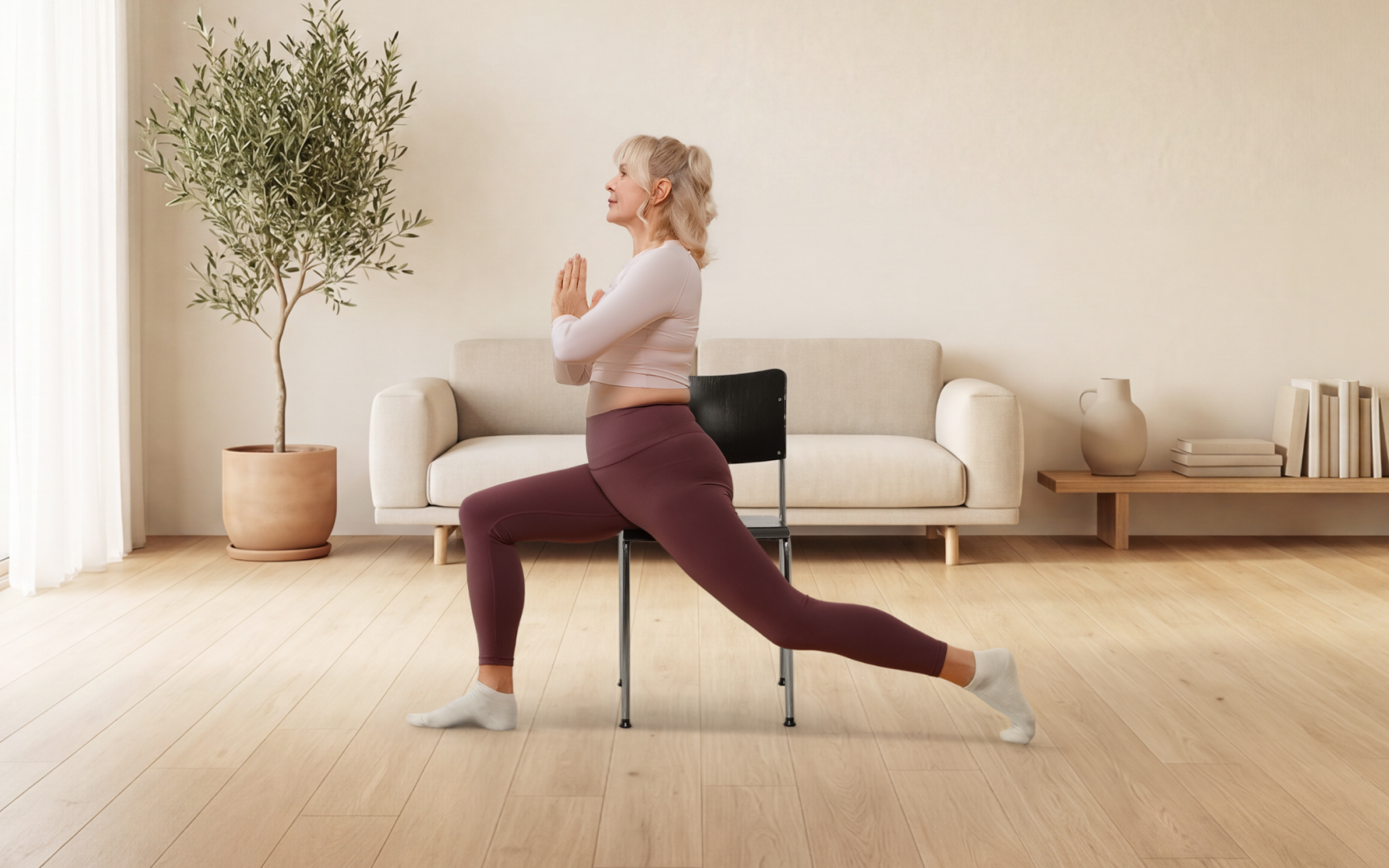 Woman performing a supported lunge during a 7-minute chair workout in a bright living room.