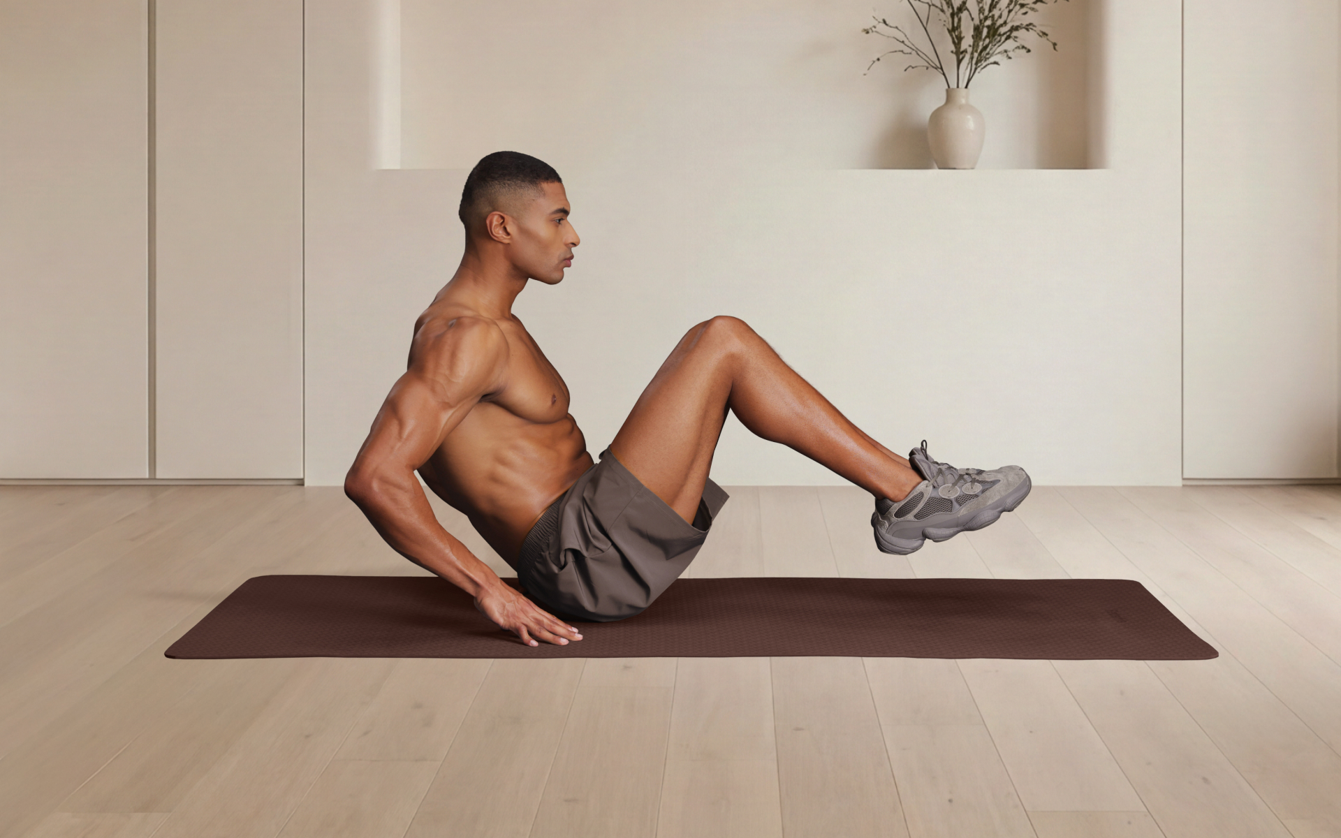 Man performing a seated core exercise on a mat at home, demonstrating beginner military calisthenics with a simple bodyweight workout for strength and endurance.