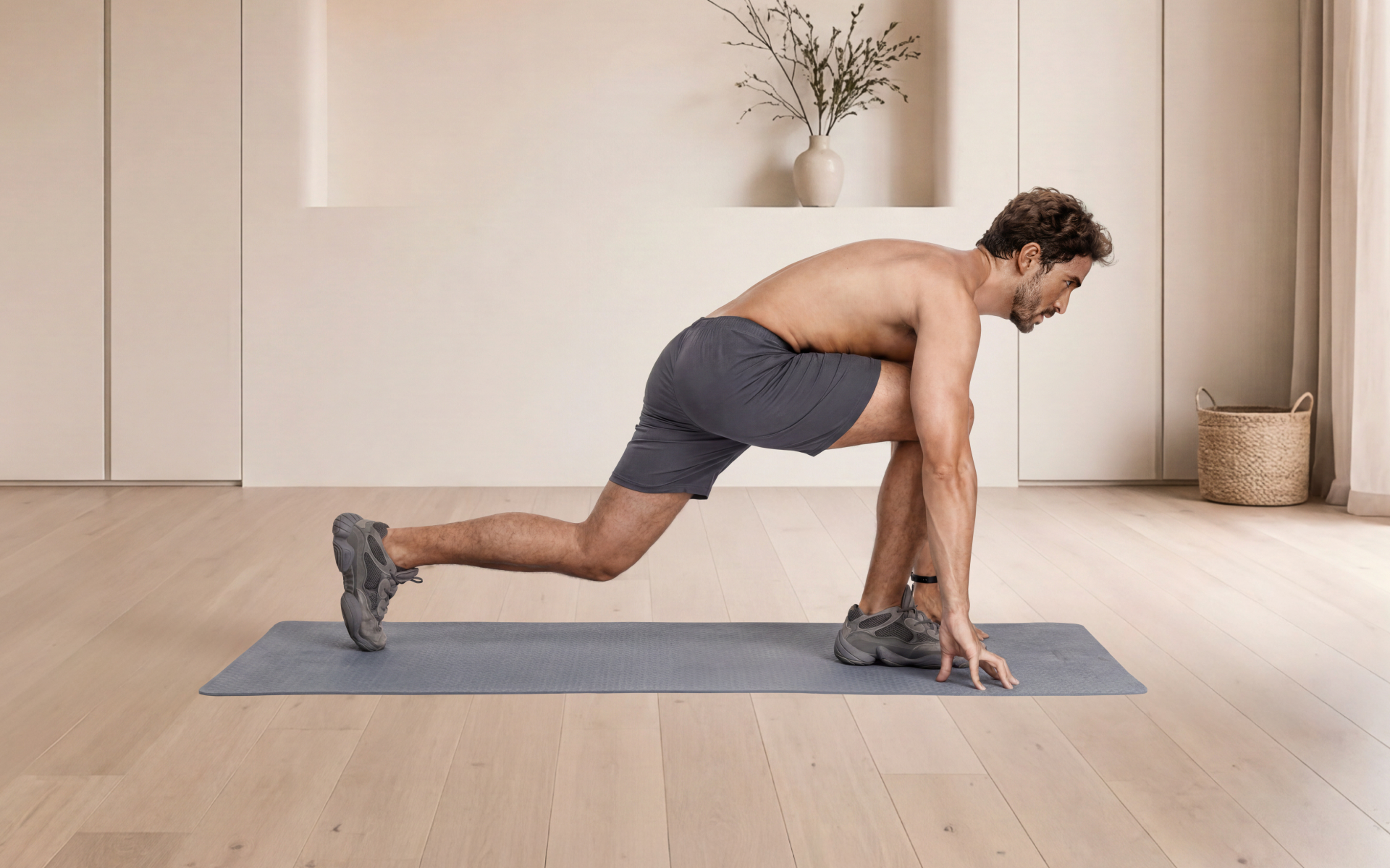 Man performing a bodyweight lunge stretch on an exercise mat as part of a military calisthenics workout plan.